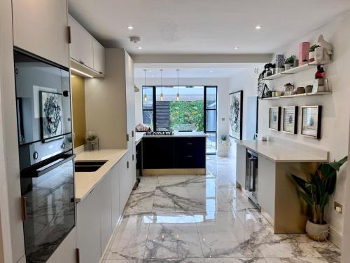 Modern, spacious, and elegant four bedroom home