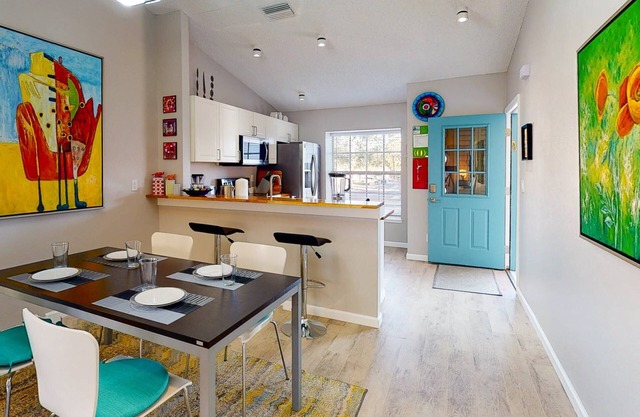 Modern Townhouse Easy Walking Distance to the Sand. Large Private Rec Room. Pool. Great Location.
