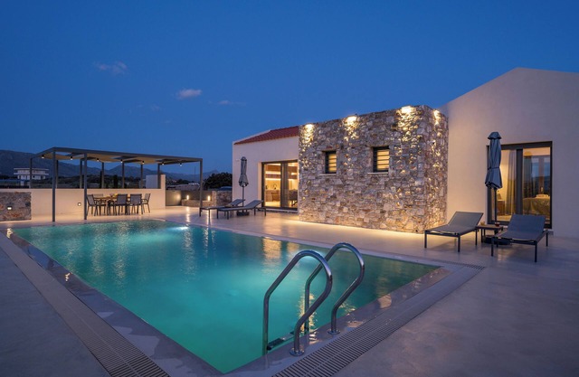 Modern villa with private heated pool and great view!