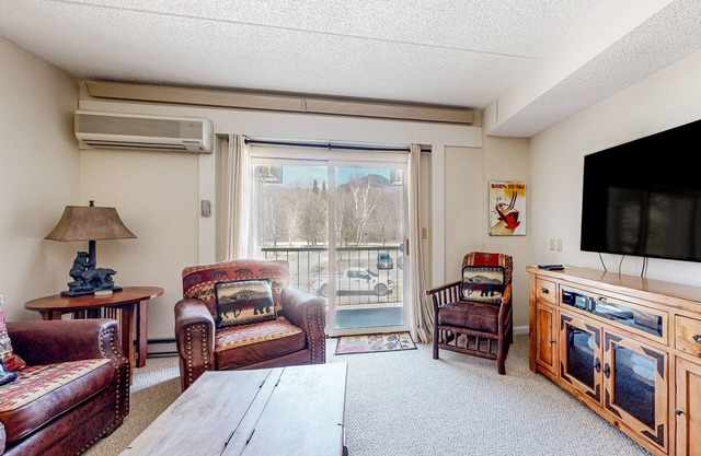 Mountain & river view condo w/pool, hot tub, game room & walk to ski lift