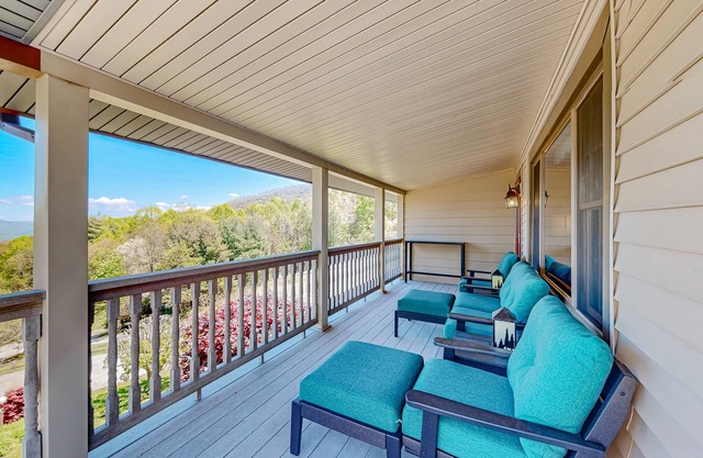 Mountain view home with a furnished deck, gas fireplace and washer/dryer