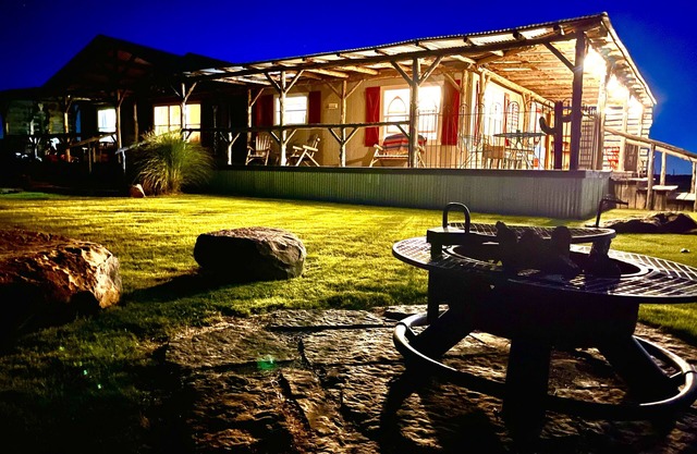 Mountain views, wrap around porch, incredible lawn with fire pit!