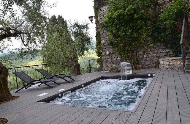 Natural stone house in panoramic position with pool and garden.