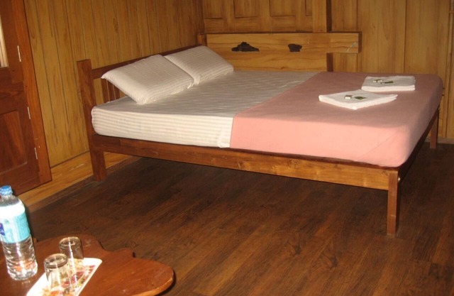 Nature Castle-A Traditional Kerala Style wooden home