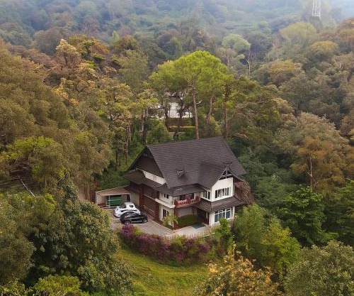 Nature Valley Farmhouse Resort by Raarees, Munnar #lap of nature #premium rooms #parking #Scenic view #garden with fireplace #property of the year