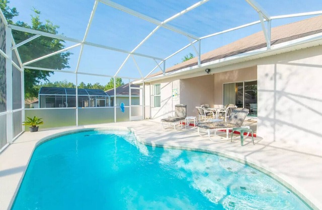 near Disney Private Pool 4 BR 3 bath Family Game room HDTV Wi-Fi
