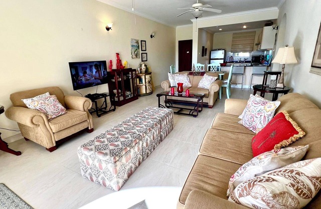 Nestled on the prestigious Barbados Golf Course, this charming two-bedroom called “Island Time”