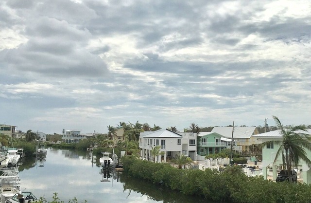 NEW & BEAUTIFUL HOME WATERFRONT WITH HEATED POOL AND FULL OUTDOOR KITCHEN