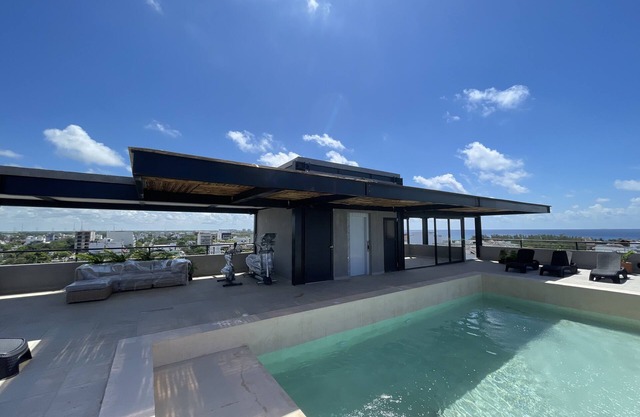 New Luxury Condo in Playa Del Carmen! Off 5th Ave and short walk to the beach!