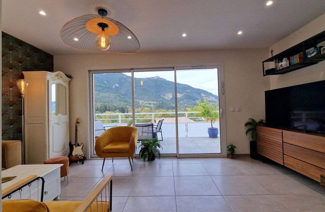 New top floor apartment with large terraces and breathtaking mountain views