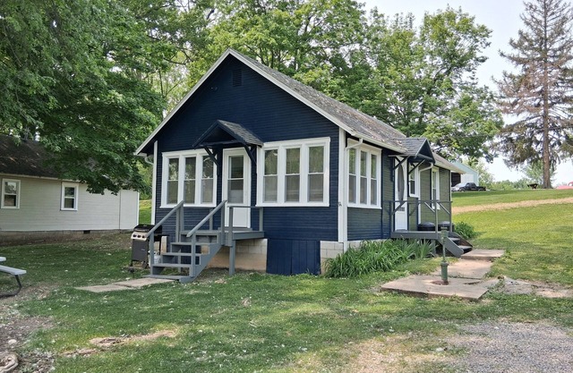 Newland's Resort: Cozy Channel Front Cottage #1 on Indian Lake with a boat dock