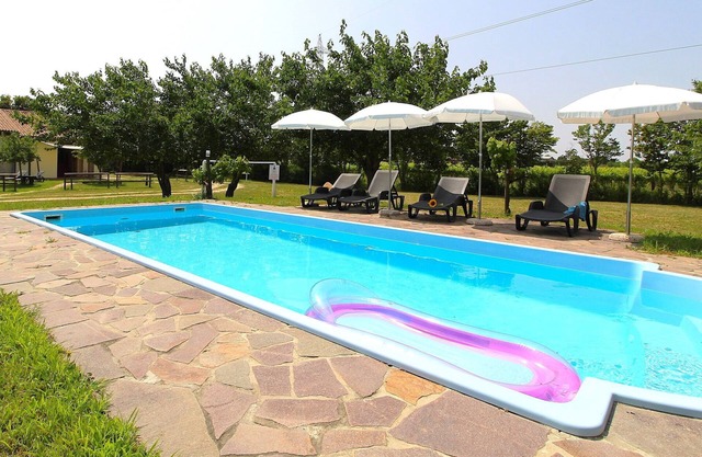 Nice apartment in villa for 4 people with WIFI, pool, A/C, patio and parking