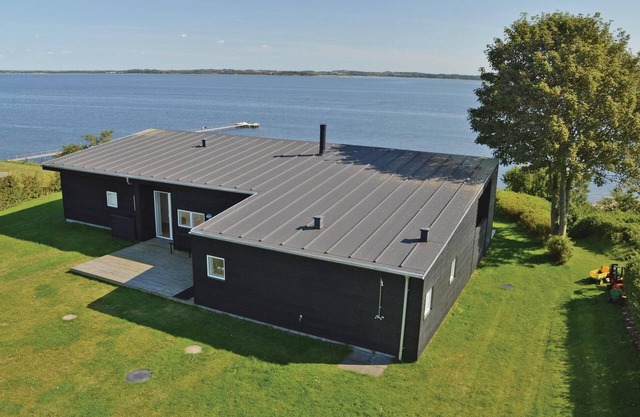 Nice home in Roslev with house sea view