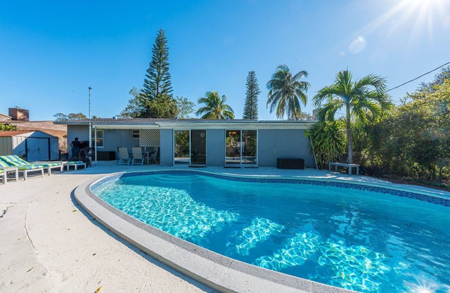 North Miami Beach family villa with HEATED pool & grill. Minutes to beach!