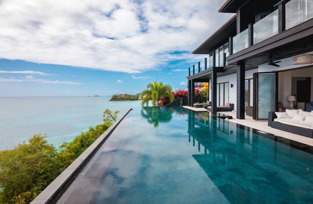 Oceanfront 4-Bedroom Retreat with Infinity Pool
