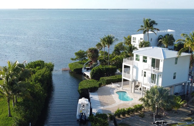Oceanfront Oasis with Private Heated Pool and Dock. Beautiful Newer Build!