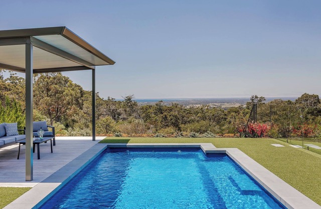 PICTURESQUE RURAL OASIS ON 6 ACRES BOASTS PANORAMIC BUSHLAND AND OCEAN VIEWS