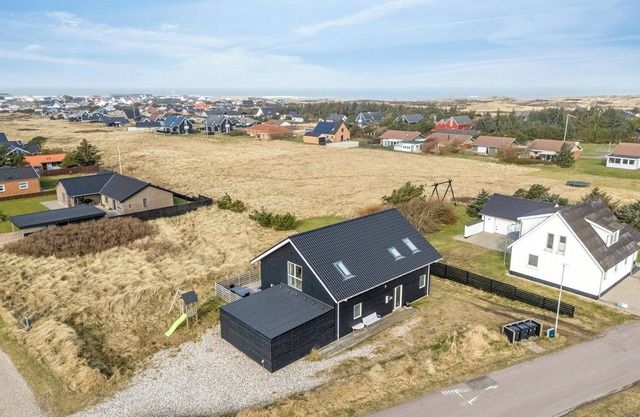 Pool house with activity room, built in 2020, with a view of the North Sea.
