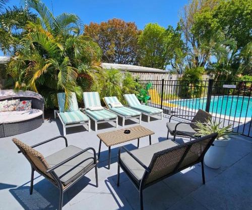 Prime Location Gateway with Pool & Patios, Near Beaches, Groceries and Restaurants