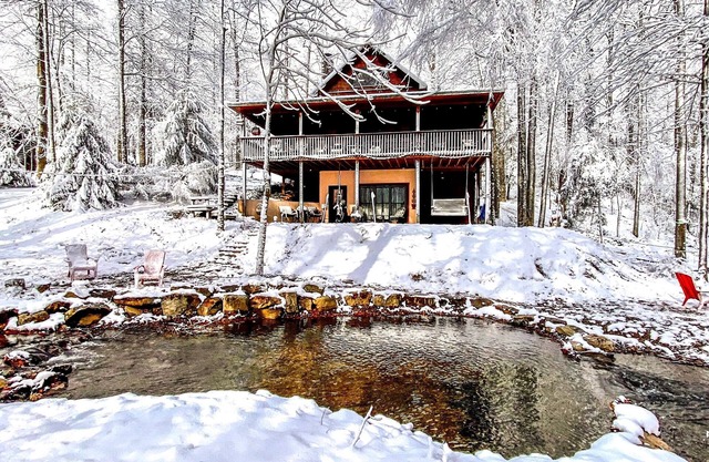 Private 2 acres on creek. Hot tub. Generator. Huge carport. Owner managed.