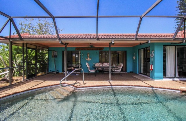 Private 3 bed heated pool home within 10 minutes to the beach and restaurants.