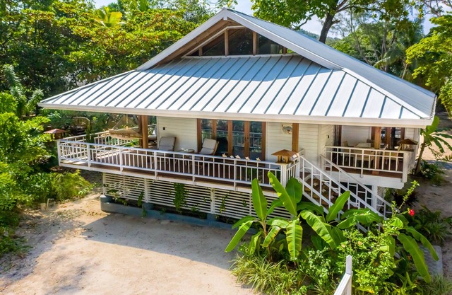 Private BEACHFRONT BUNGALOW- Perfect location! Gated community! Paradise Awaits!
