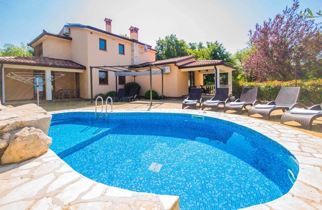 Private, fully fenced and pet-friendly pool villa near the sea