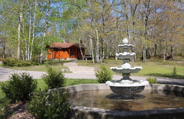 Private log cabin with view overlooking Grand Lake