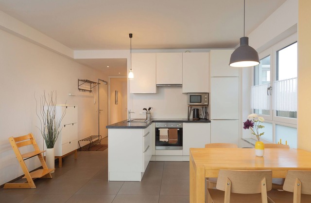 Quiet and bright apartment with big garden and garage