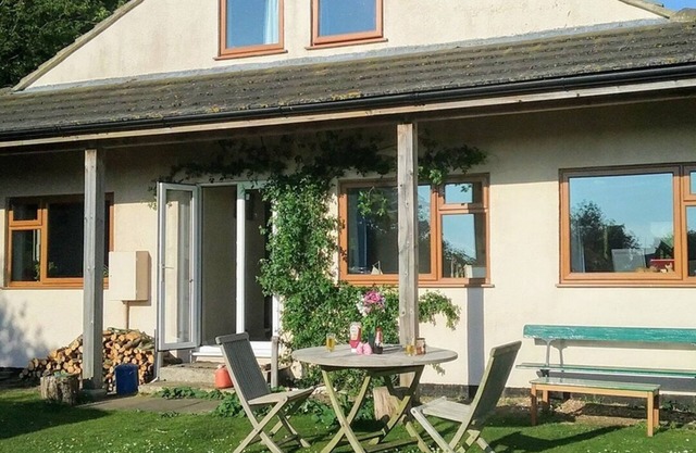 Quirky house created around a Victorian railway carriage, close to a quiet beach
