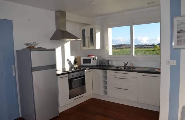 Recent house with large garden at 700 m. from the small harbour and the beach