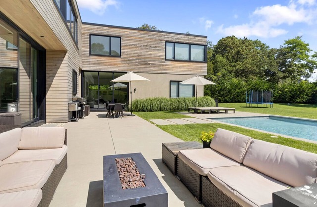 Recently constructed modern-style home with a gated entrance, private pool,.