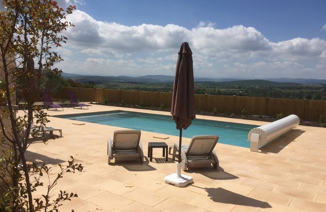 Relax and recharge in this luxury villa with heated pool and stunning views.