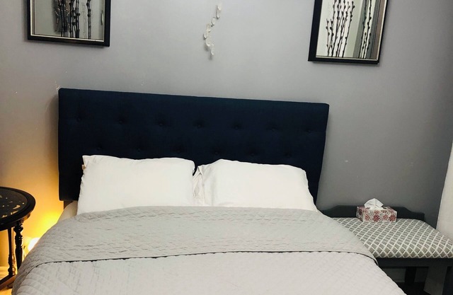 Relax in our cozy room with a private bath, designed for comfort and privacy.