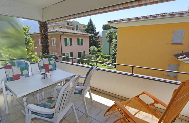 Renovated apartment on side street with balcony and indoor pool