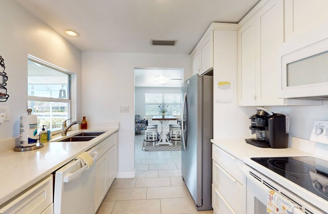 Renovated Luxe Waterfront Getaway | Heated Pool, Screened Lanai & Boat Dock