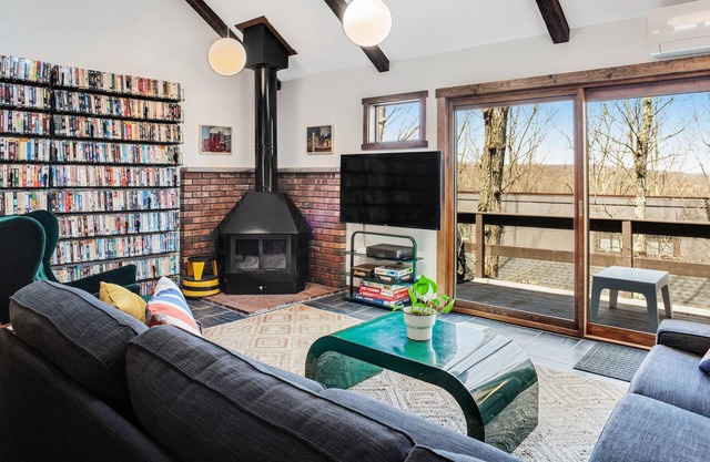 Retro townhome with huge VHS collection, fireplace, shared indoor pool & gym