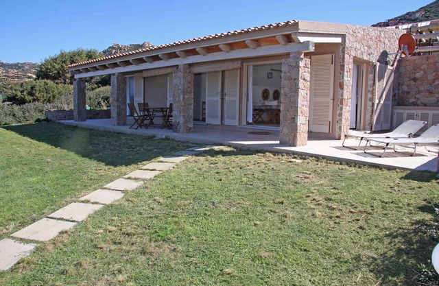 Romantic home by the natural pools of Li Baietti, sea front