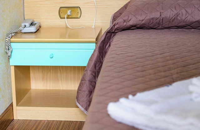 Room 'Tripla - Letti Singoli' with Shared Garden, Wi-Fi and Air Conditioning