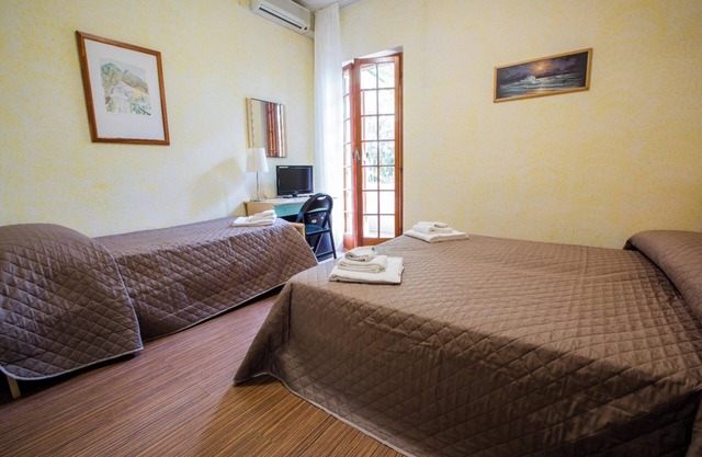 Room 'Tripla' with Shared Garden, Wi-Fi and Air Conditioning