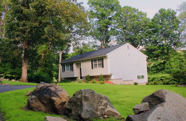 Rustic Charm Meets Modern Comfort 3-Bedroom Raised-Ranch Cottage in Wooded Area