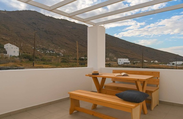 Santorini's Old Mill Serene Getaway by Pori Beach