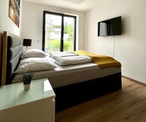 Schöne Wohnung mit Terrasse und Parkplatz