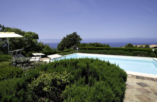 Sea-view three-family villa with shared private pool