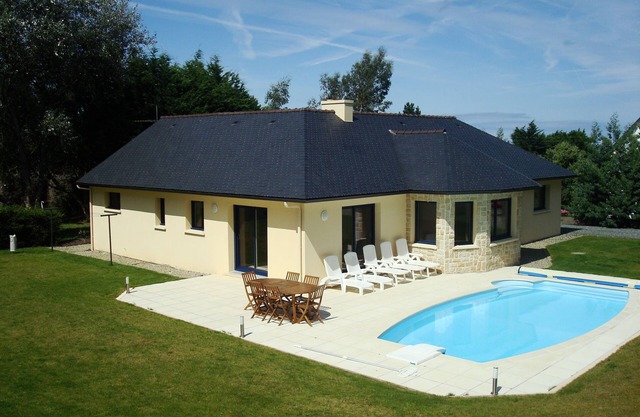 Seaside villa with private heated pool
