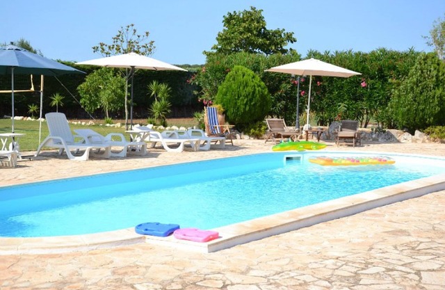 Semi-detached house with garden and pool