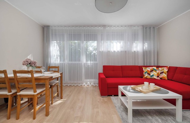 Sempołowskiej 68 Wrocław | Red Apartment with Desk for Remote Work