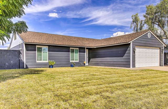 Single-level dog-friendly home with private pool, grill, enclosed backyard, & AC