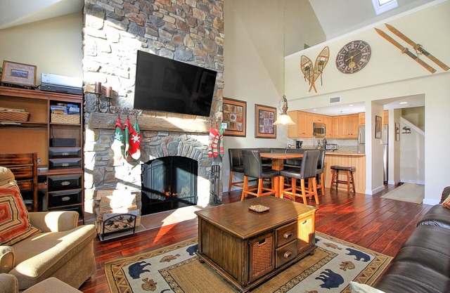 Ski-in/out condo with mountain and lift views, hot tub, & pool