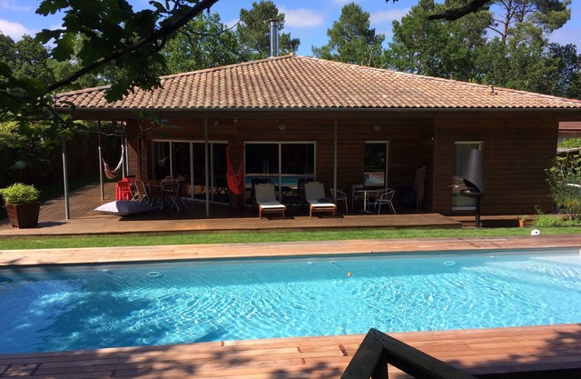 Spacious and contemporary interior and equally pleasant woodsy exterior
